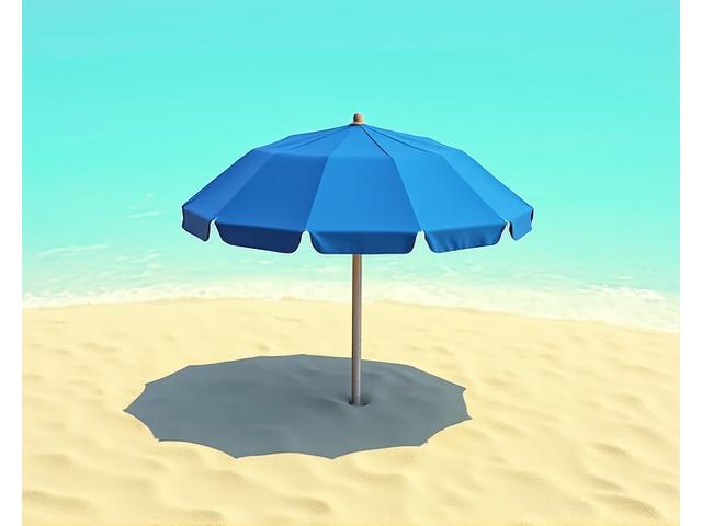 Vibrant blue beach umbrella standing proudly on a sunny beach